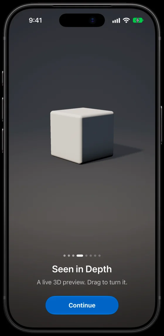 A lit cube seen through a glass lens, titled Seen in Depth